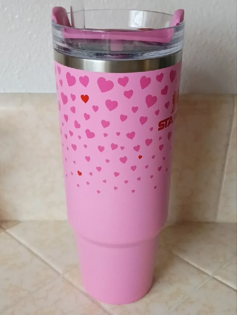 Stanley Pink Travel Mug with Red Logo and Heart Pattern Accent - Picture 2 of 6